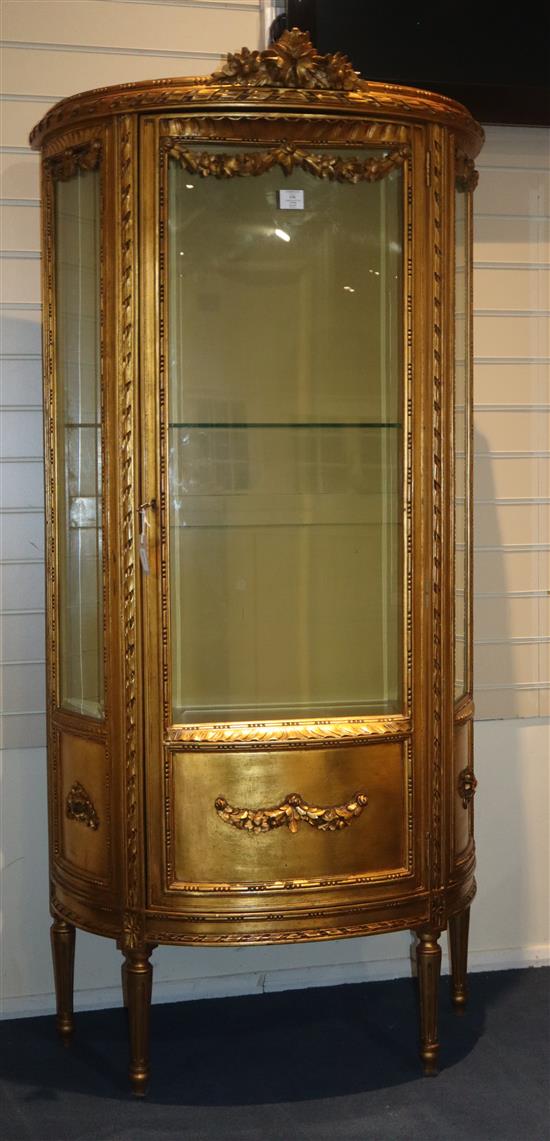 A Louis XVI style carved giltwood vitrine, W.2ft 11in. D.1ft 4in. H.5ft 9in.